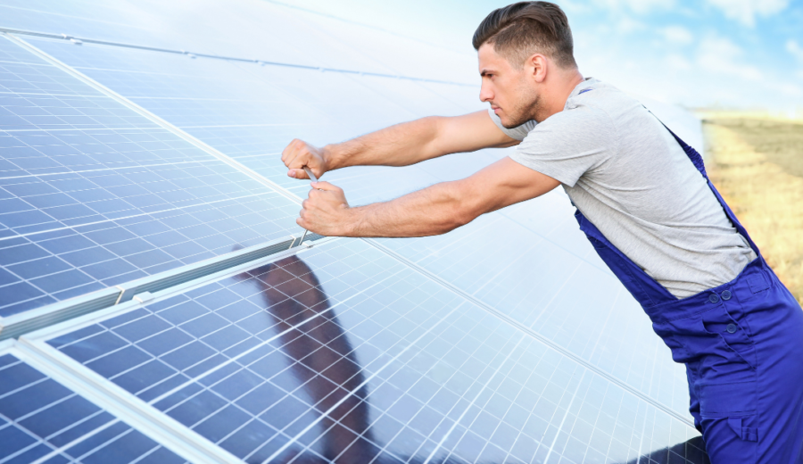 Man fitting solar panels